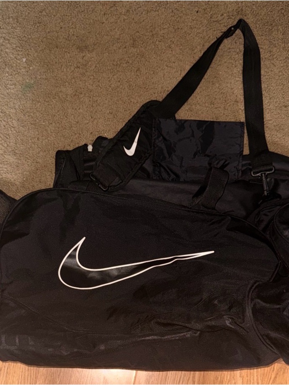 Nike Black Duffel Bag with White Swoosh Logo